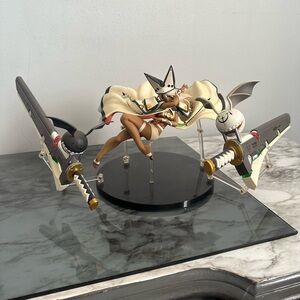 Anime Figure with Swords and Cape